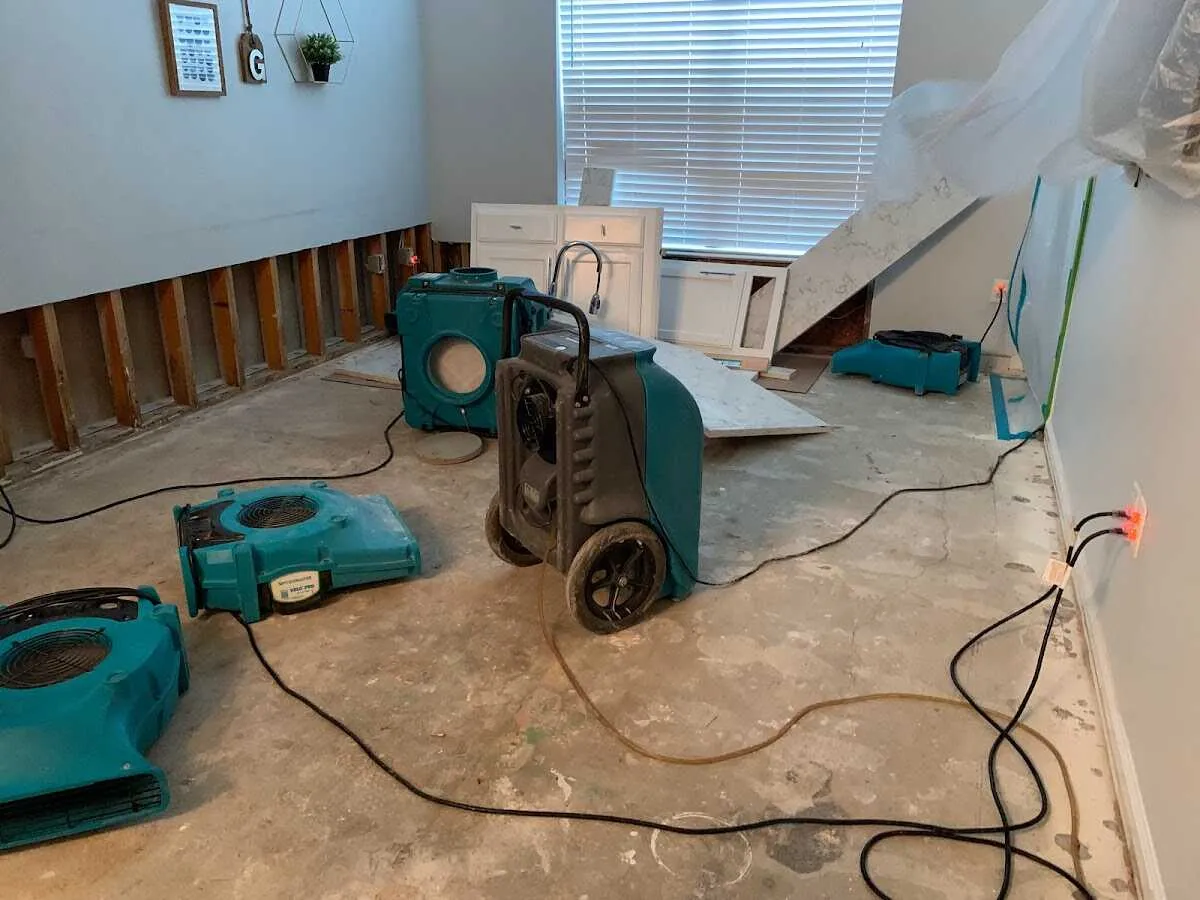 Dehumidifier in flood-cut room for Water Damage Restoration in Livonia